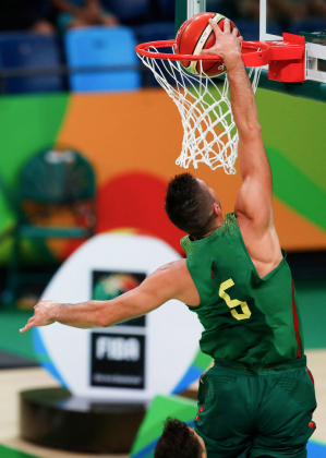professional basketball player dunking ball